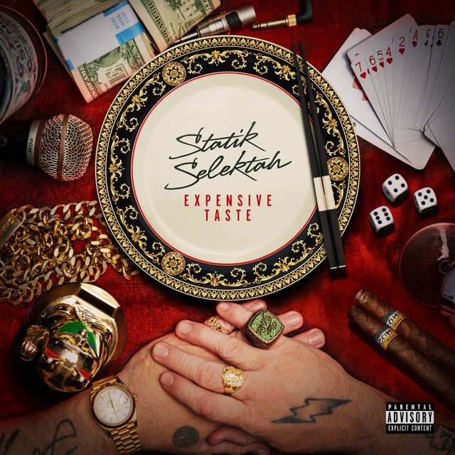 Expensive Taste cover by Statik Selektah: a gold-rimmed plate with chopsticks on a red table, surrounded by cash, chains, dice, cards, cigars and ringed hands